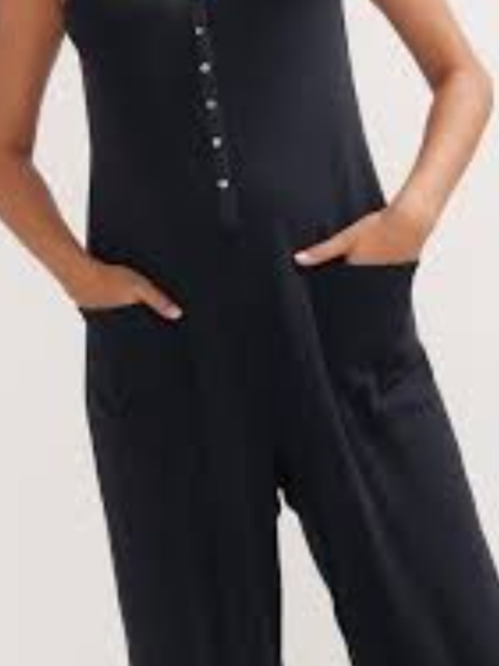 Hatch Black Sleeveless Button-Front Jumpsuit with Pockets
